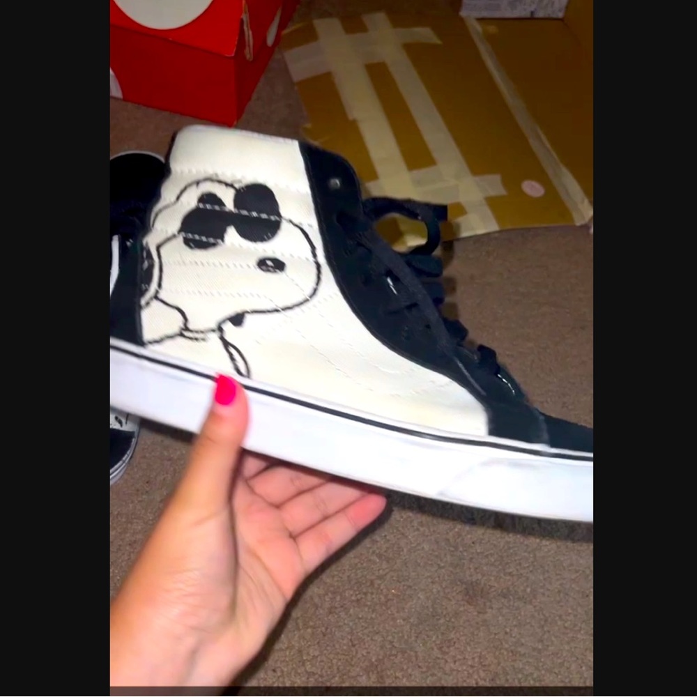 Snoopy creme and black high top vans!